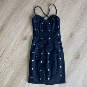 Elegant Black Dress with Floral Accents